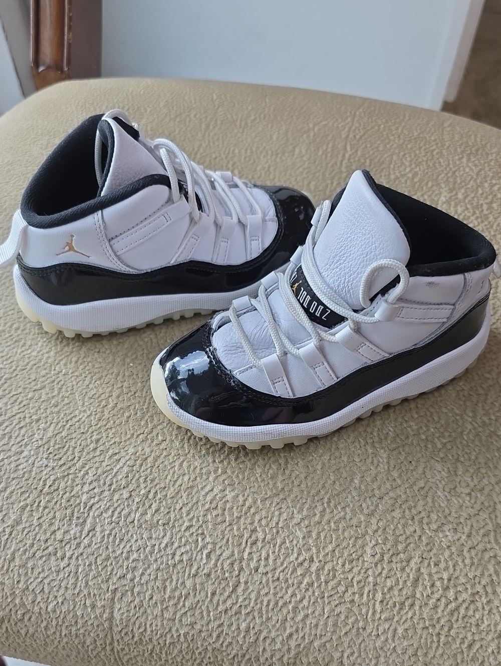 Jordan Kids Low Top Sneakers in White and Black with Gold Jumpman